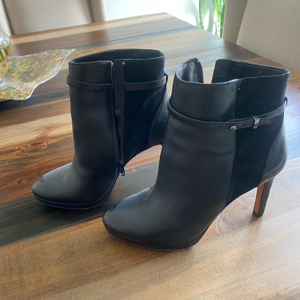Black Antonio Melani boots size 9.